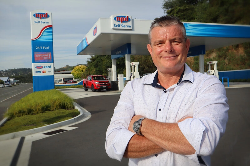 Barry Sheridan standing in front of NPD's St Vincent St self-serve fuel station